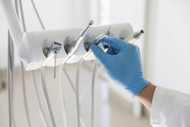 Professional Teeth Whitening technician working in Olympia Heights, FL